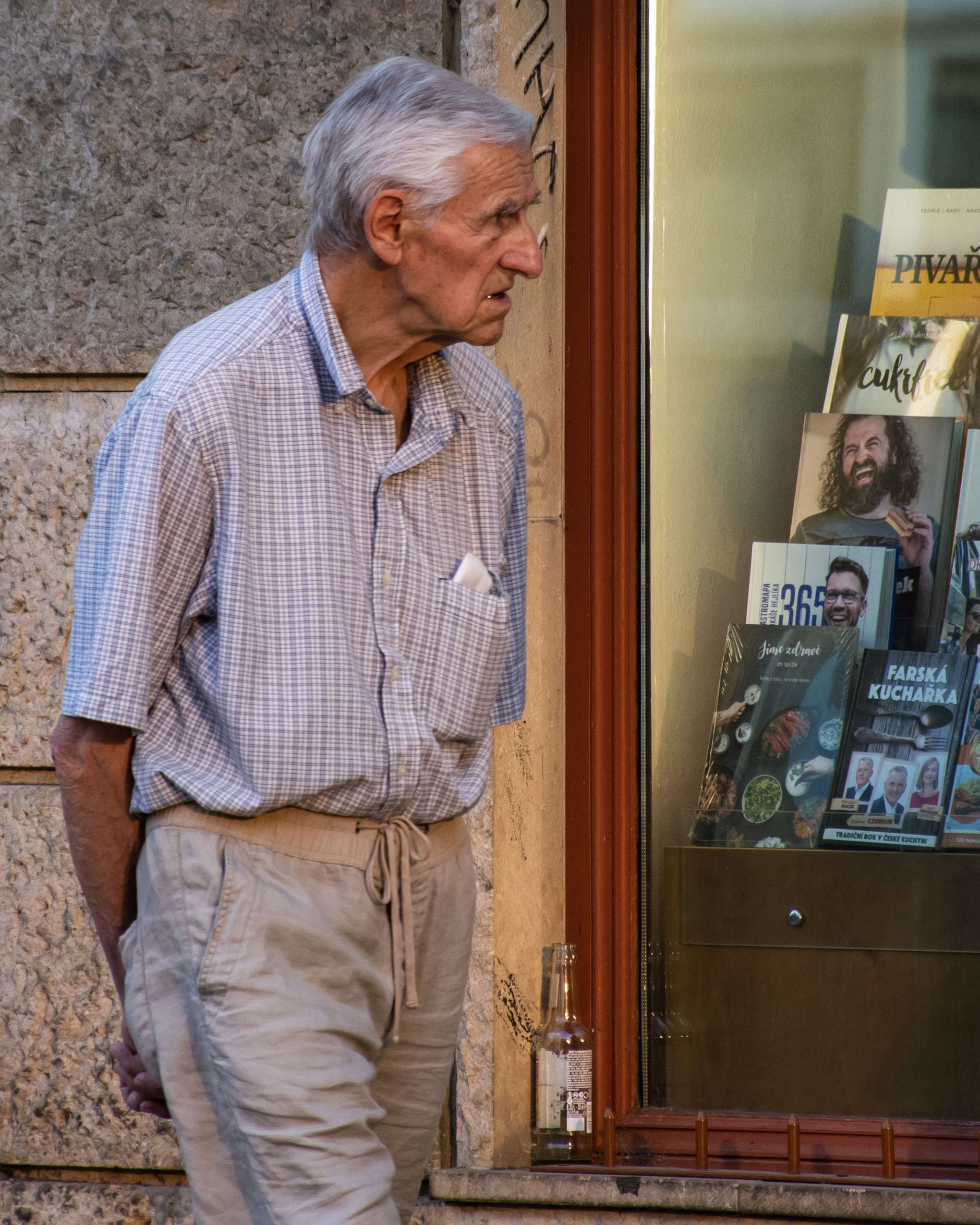 Man looking at a bookstore