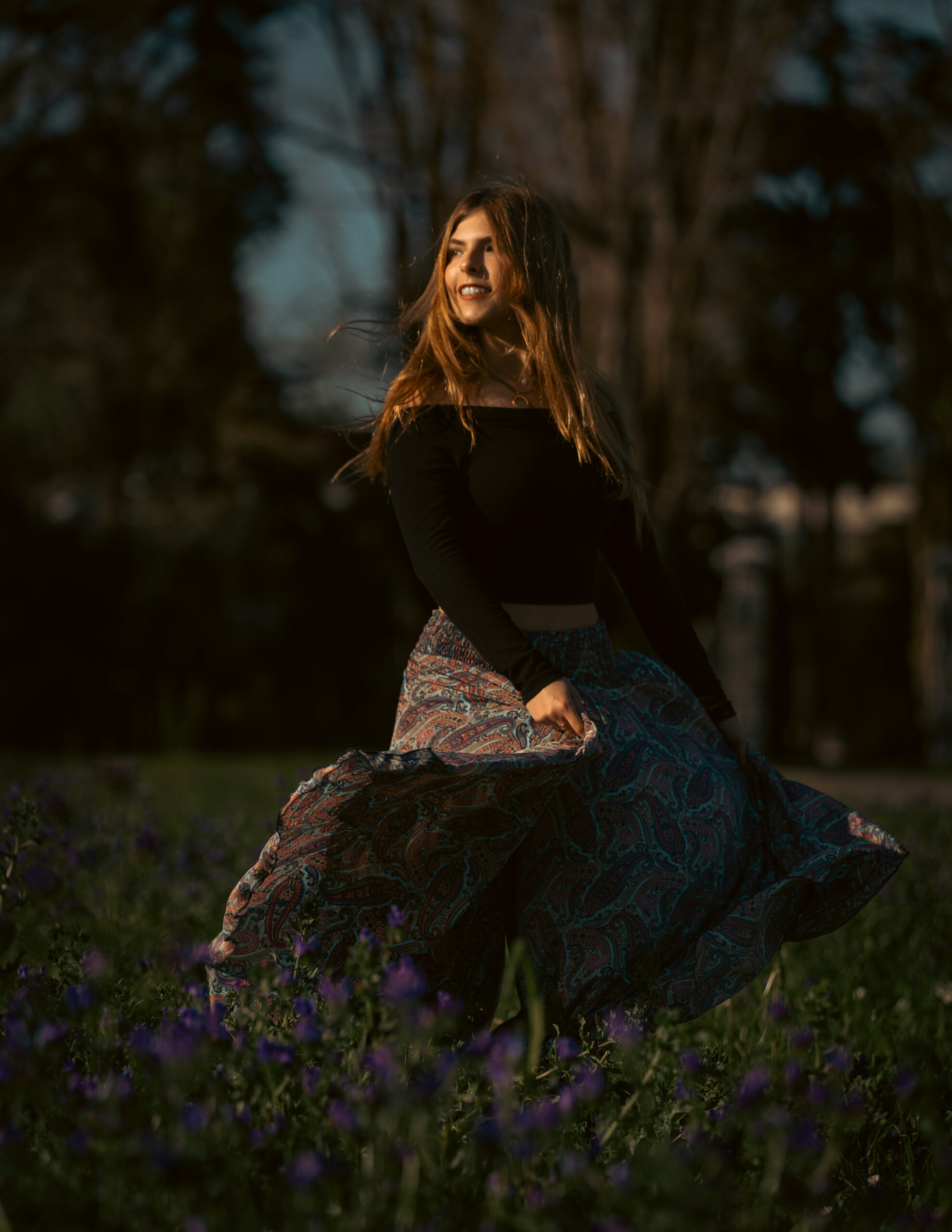 Girl running through the floral field